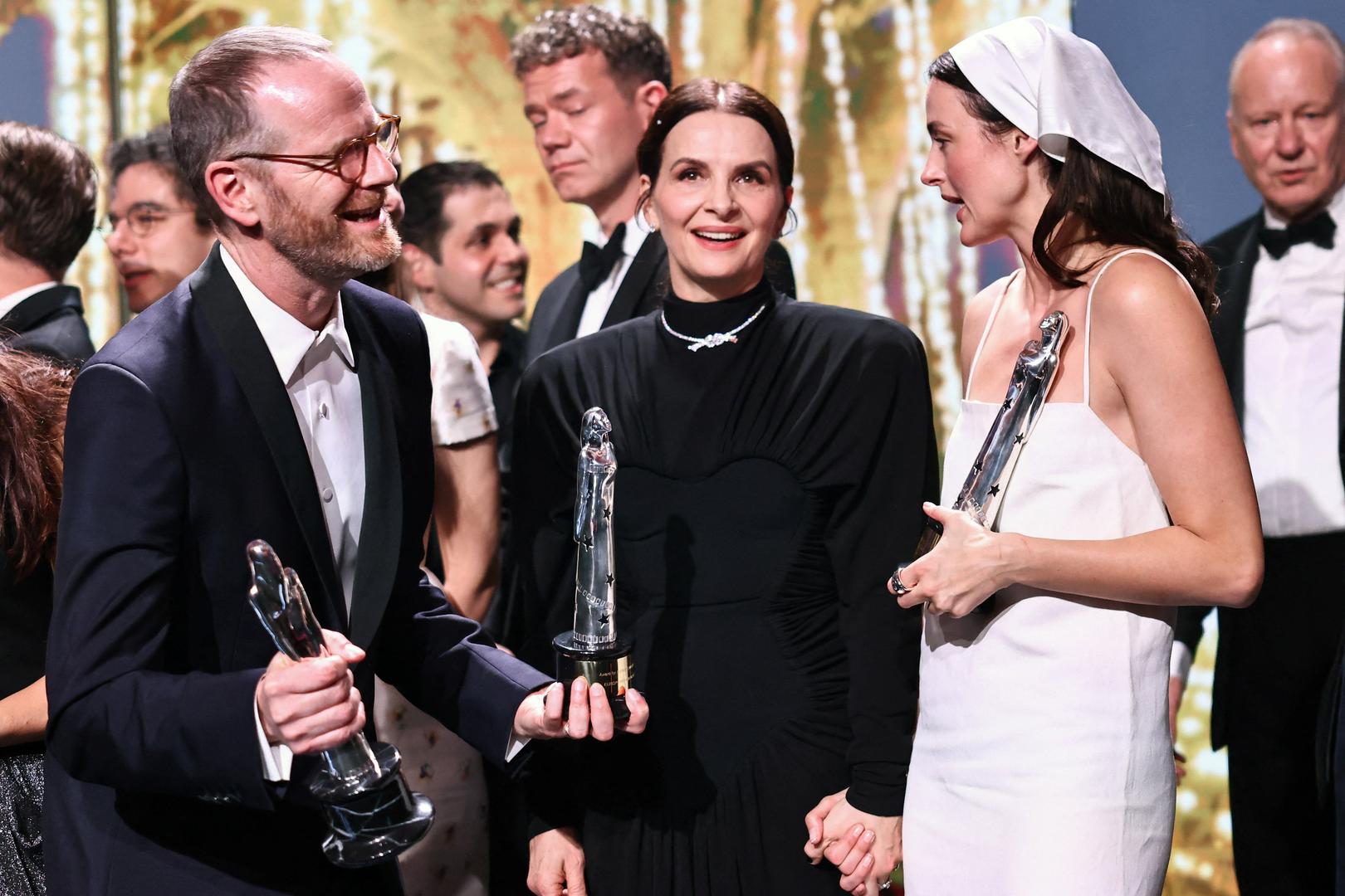 Joachim Trier, Juliette Binoche i Renate Reinsve  