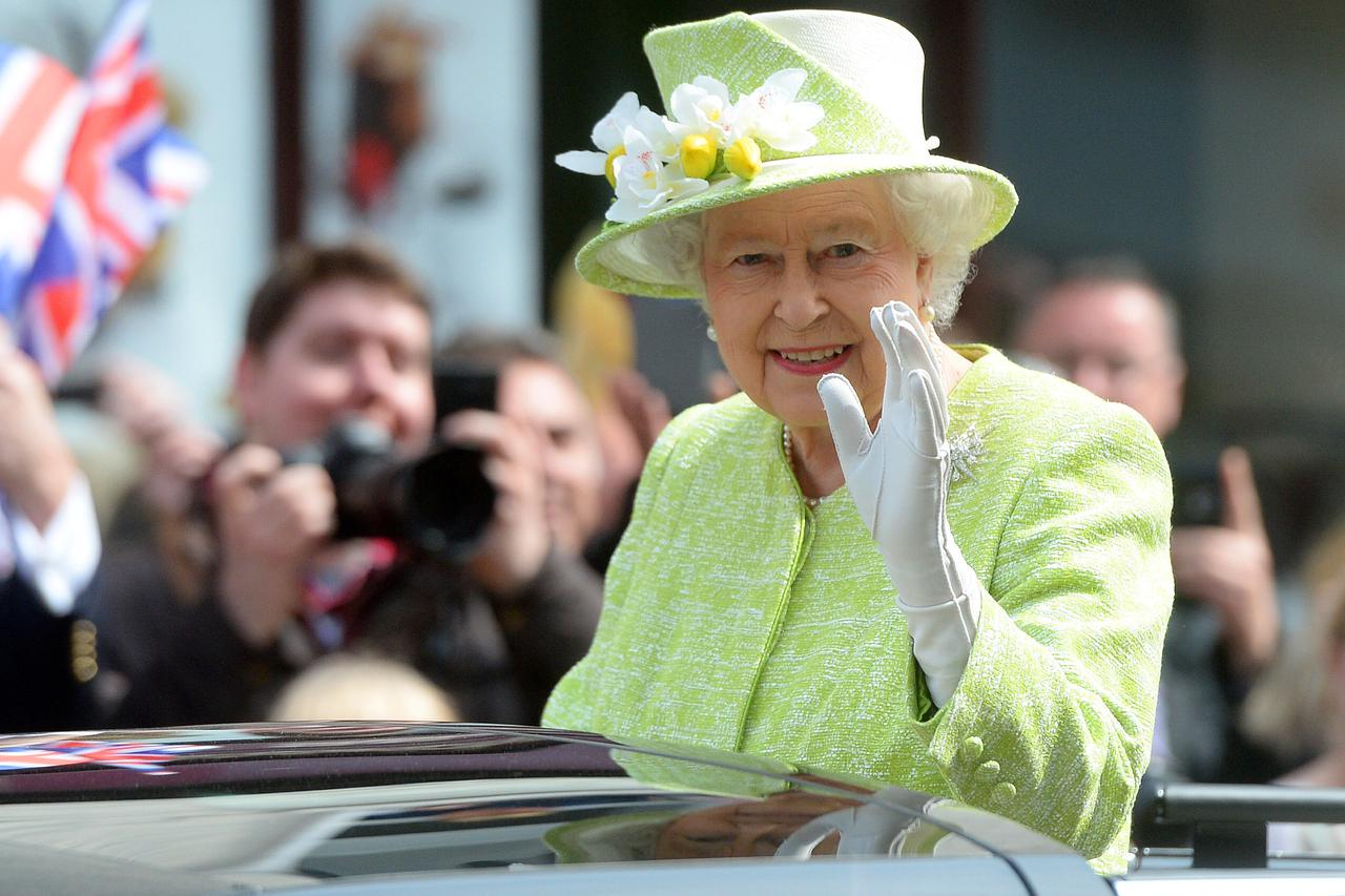 Queen's 90th birthday celebrationsQueen Elizabeth II waves to well wishers from a open top Range Rover in Windsor, Berkshire, as she celebrates her 90th birthday.Anthony Devlin Photo: Press Association/PIXSELL