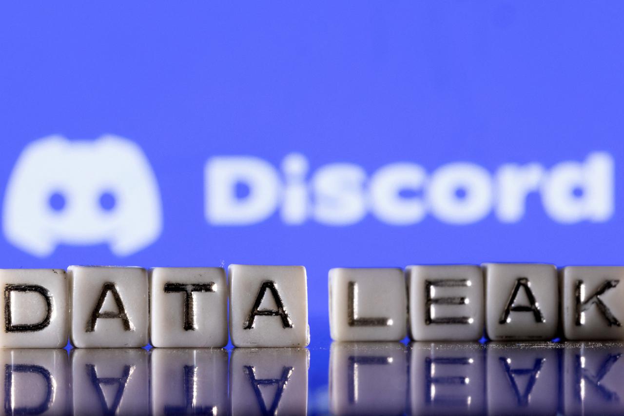 Illustration shows plastic letters arranged to read "Data Leak", and the Discord logo