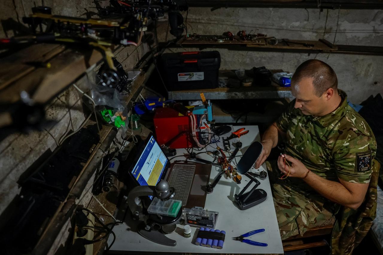 Ukrainian serviceman repairs trophy Russian-made FPV drones for own use, in Donetsk region