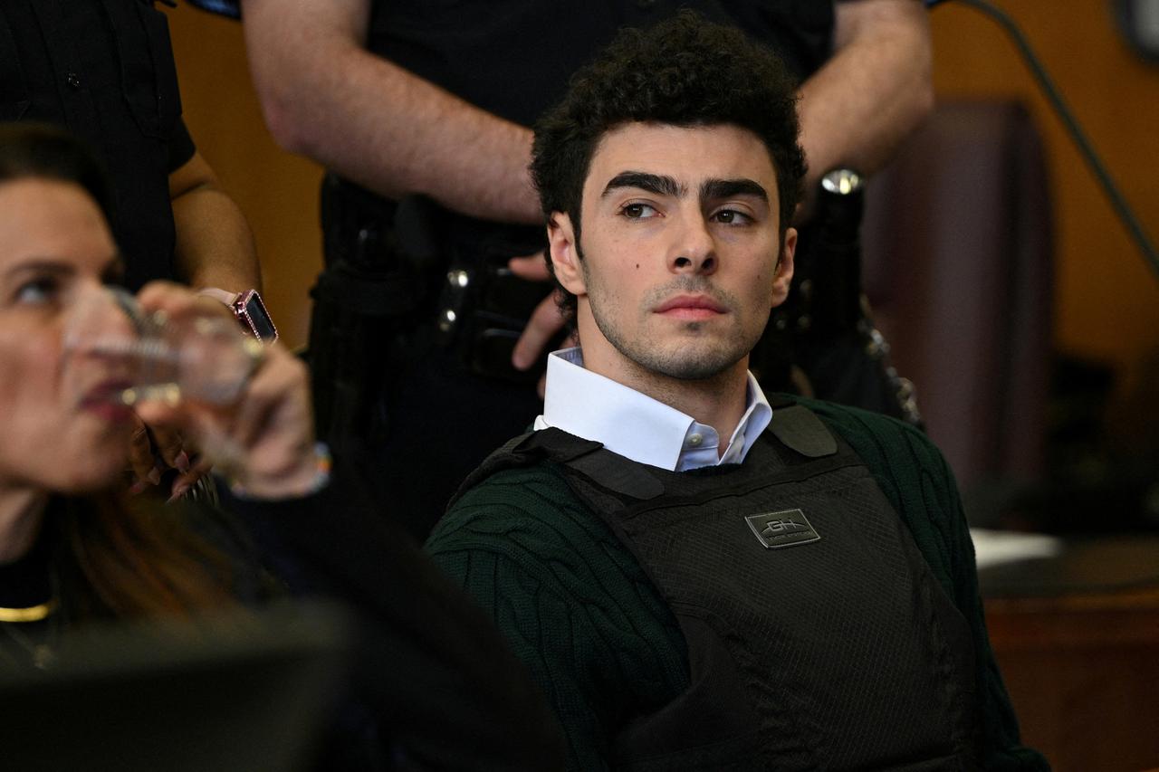 FILE PHOTO: Luigi Mangione, the suspect in the killing of UnitedHealth Group chief executive Brian Thompson, appears in Manhattan Supreme Court in New York City