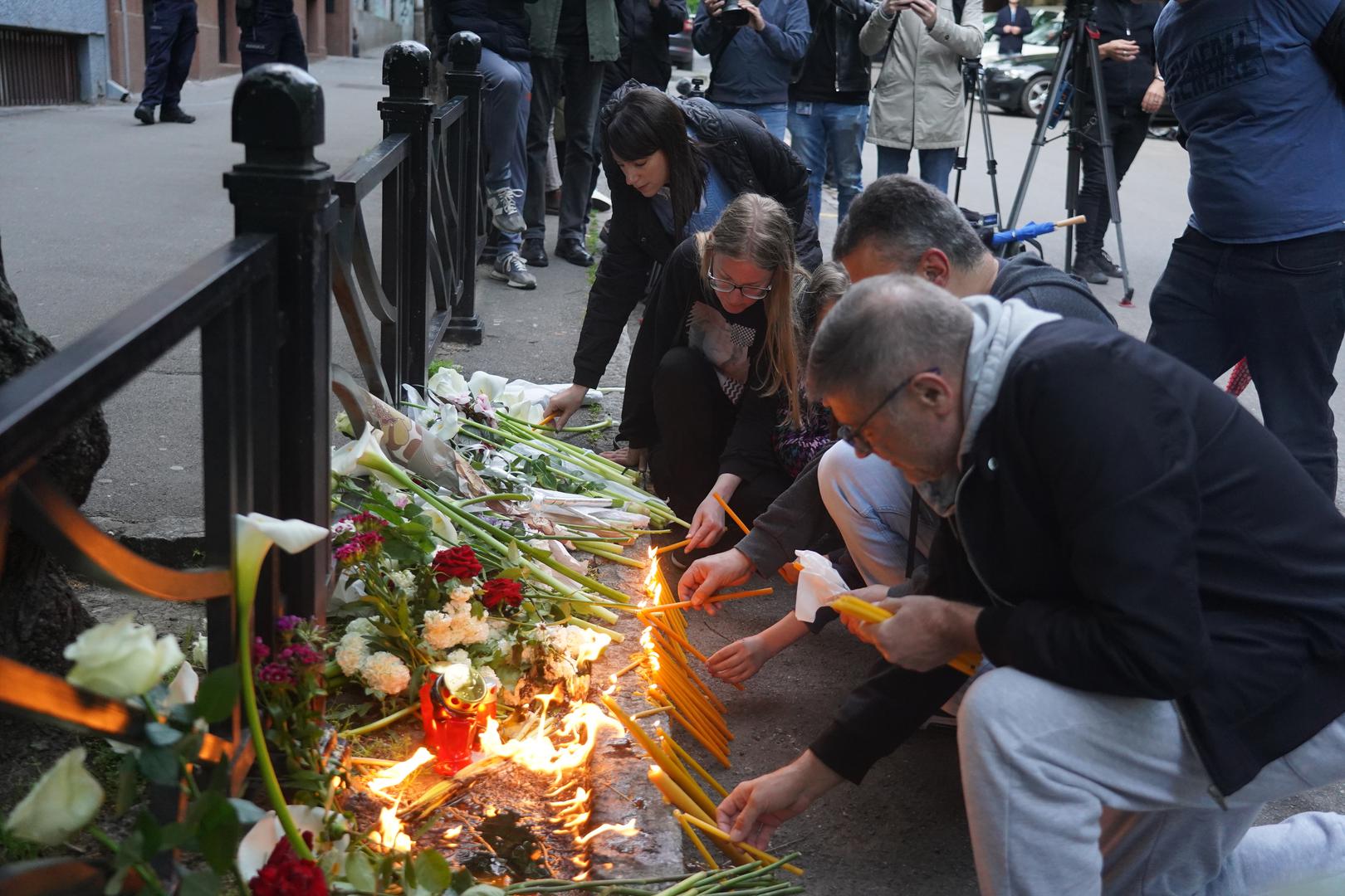 03, May, 2023, Belgrade - Citizens lay flowers and light candles in front of the "Vladislav Ribnikar" Elementary School, where a tragedy occurred this morning when a seventh-grade student killed eight students and a security guard.    

03, maj, 2023, Beograd - Gradjani polazu cvece i pale svece ispred Osnovne skole "Vladislav Ribnikar” gde se jutros desila tragedija kada je ucenik sedmog razreda ubio osam ucenika i radnika obezbedjena.     Photo: Antonio Ahel/ATAImages/PIXSELL