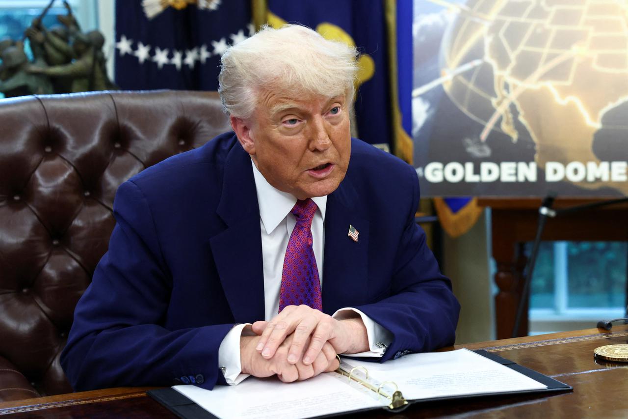 U.S. President Donald Trump and U.S. Defense Secretary Pete Hegseth make an announcement at the White House in Washington
