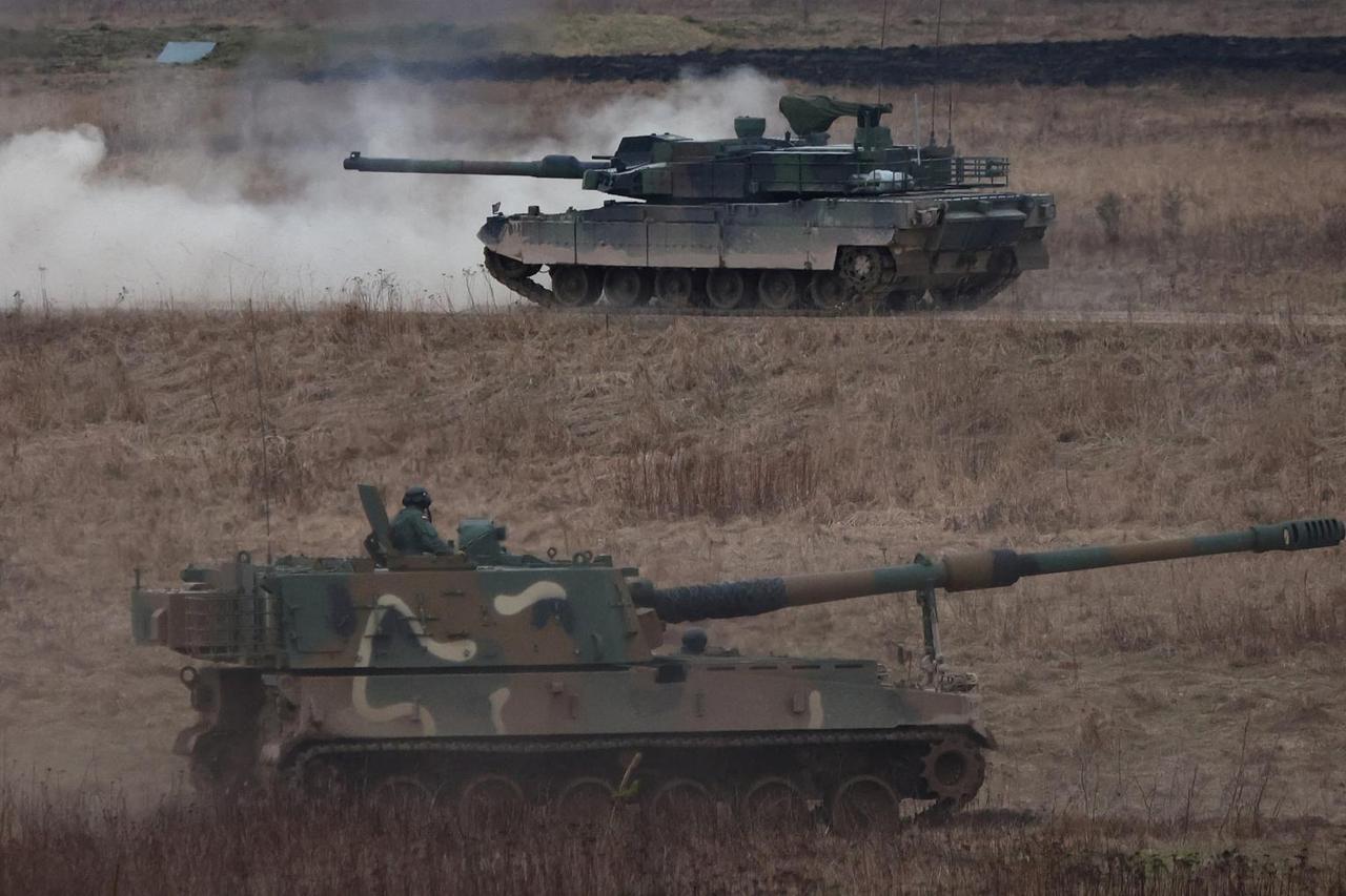 FILE PHOTO: Polish army trains with new tanks and howitzers from South Korea