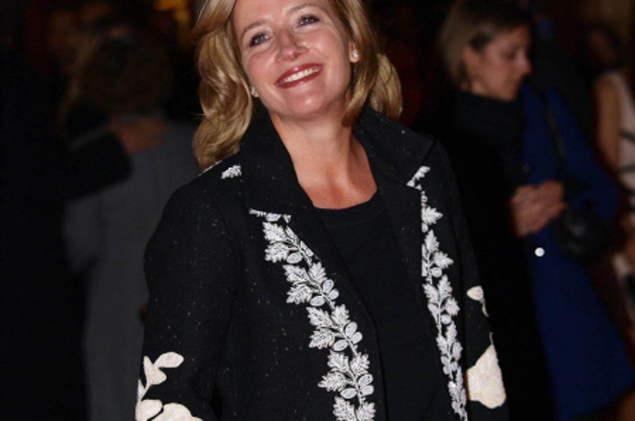 'British actress Emma Thompson arrives for the Premiere of her latest film \' An Education\', directed by Lone Sherfig (out of camera range) in Leicester Square, London, on October 20, 2009.  AFP Phot