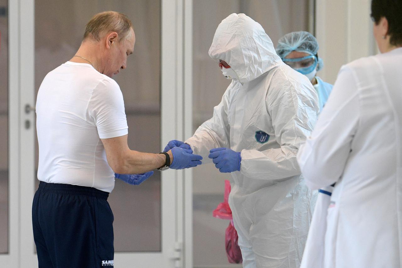 Russian President Putin visits a hospital for patients infected with coronavirus disease (COVID-19) on the outskirts of Moscow
