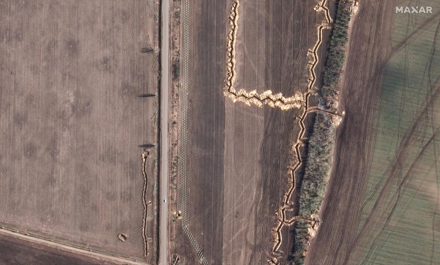 A satellite image shows an overview of rows of fortifications called "dragon's teeth" and trenches built by the Russian army in the Vasylivka district, amid Russia's attack on Ukraine, in Zaporizhzhia region, Ukraine, March 4, 2023. Maxar Technologies/Handout via REUTERS THIS IMAGE HAS BEEN SUPPLIED BY A THIRD PARTY. NO RESALES. NO ARCHIVES. MANDATORY CREDIT. DO NOT OBSCURE LOGO  REFILE - CORRECTING DATE FROM "NOVEMBER 15, 2022" TO "MARCH 4, 2023\ Photo: MAXAR TECHNOLOGIES/REUTERS