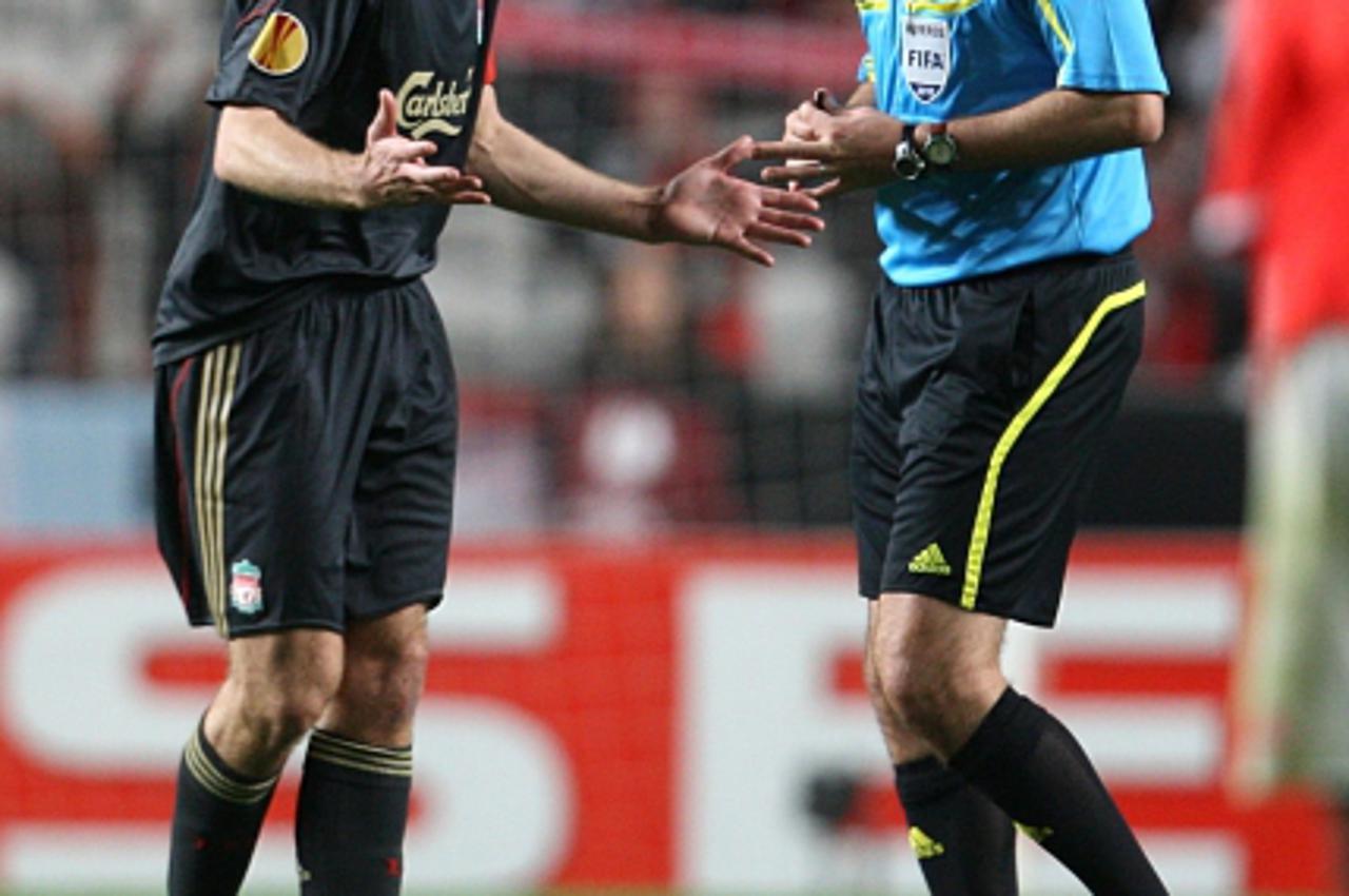 'Liverpool\'s Steven Gerrard complains to the referee Jonas Eriksson Photo: Press Association/Pixsell'