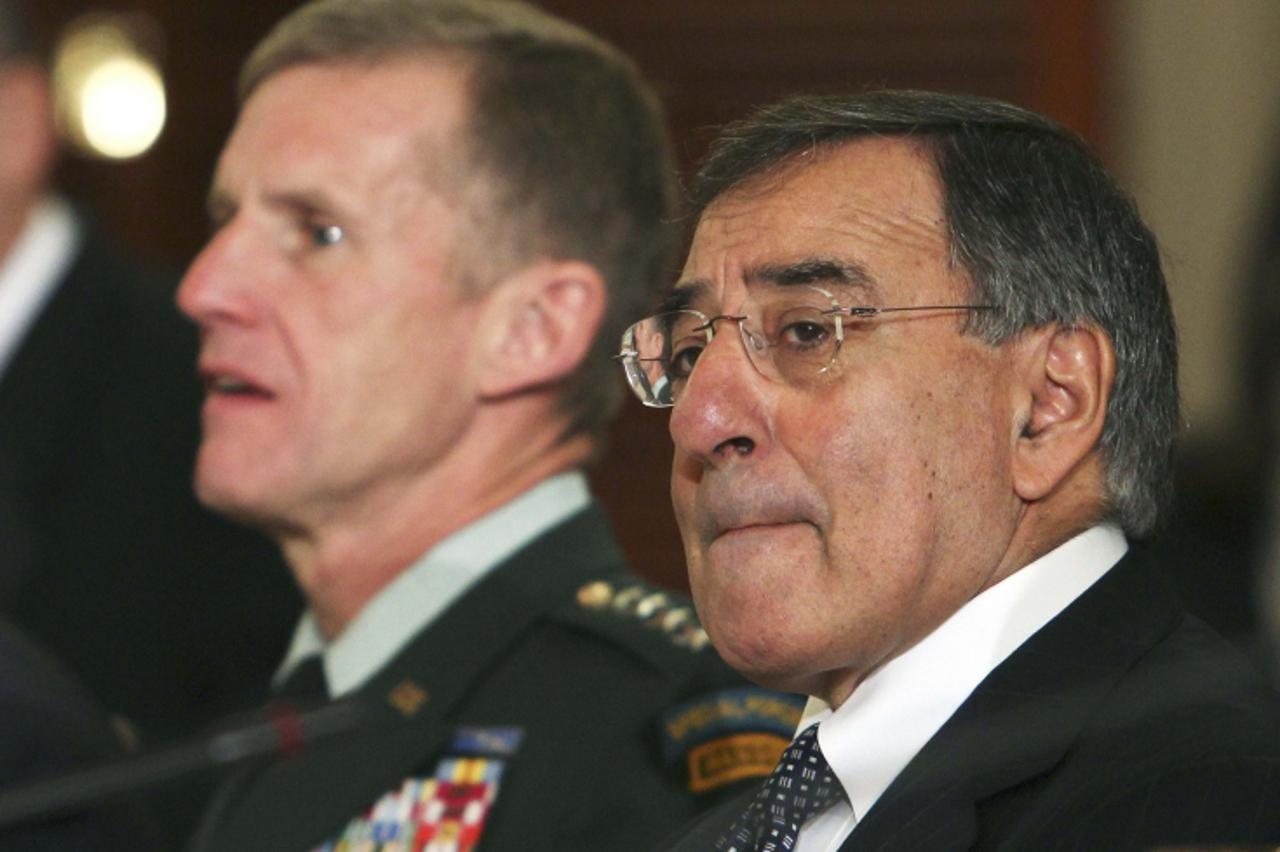 'Director of the CIA Leon Panetta sits next to the commander of the International Security Assistance Force and U.S. Forces-Afghanistan Gen. Stanley McChrystal (L) as they wait for U.S. Secretary of S