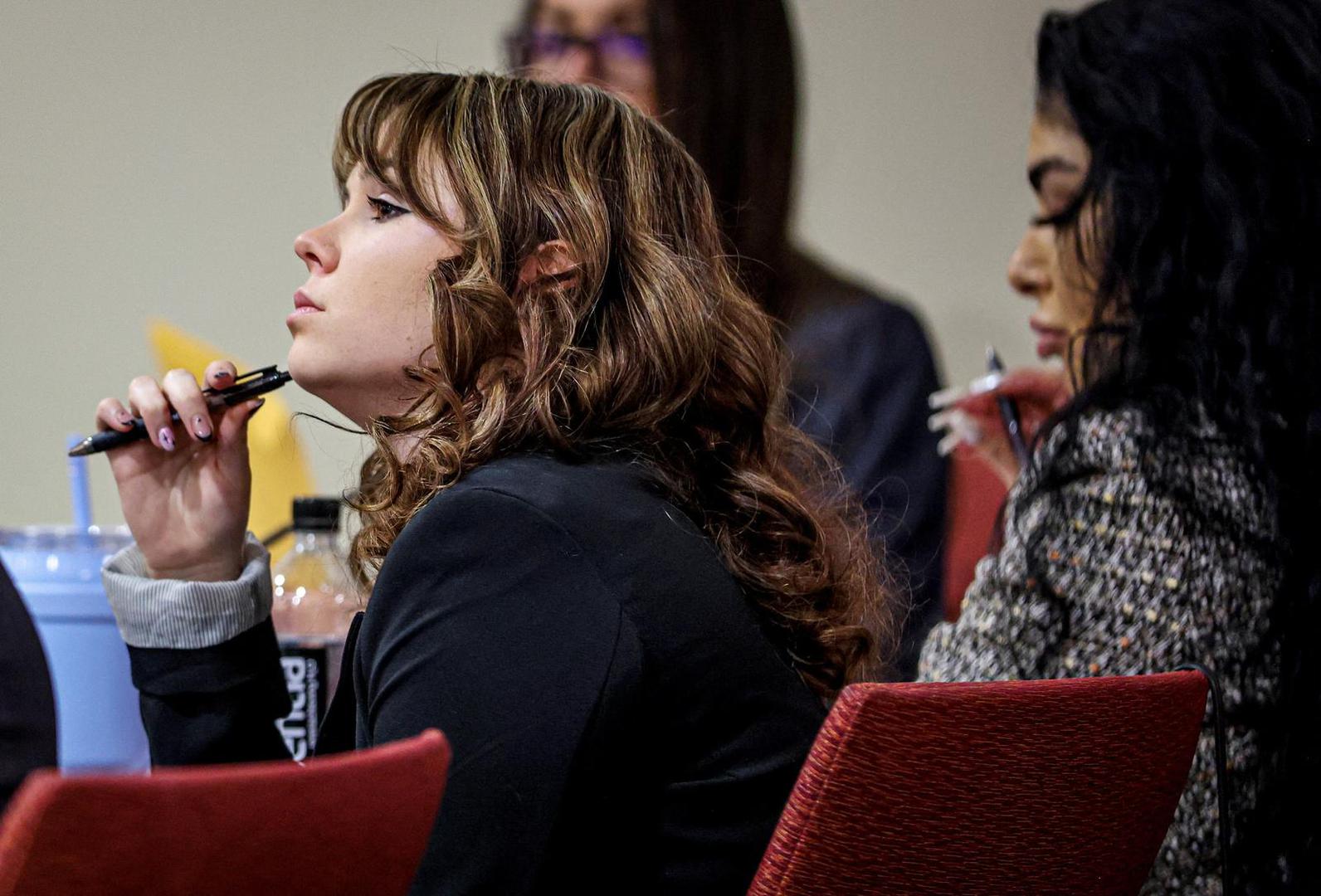 Rust film set armorer Hannah Gutierrez-Reed listens while expert witness Bryan Carpenter testifies during Gutierrez-Reed’s involuntary manslaughter trial at the First Judicial District Courthouse in Santa Fe, New Mexico, U.S., February 29, 2024.    Gabriela Campos/The New Mexican/Pool via REUTERS Photo: Gabriela Campos/The New Mexican/REUTERS
