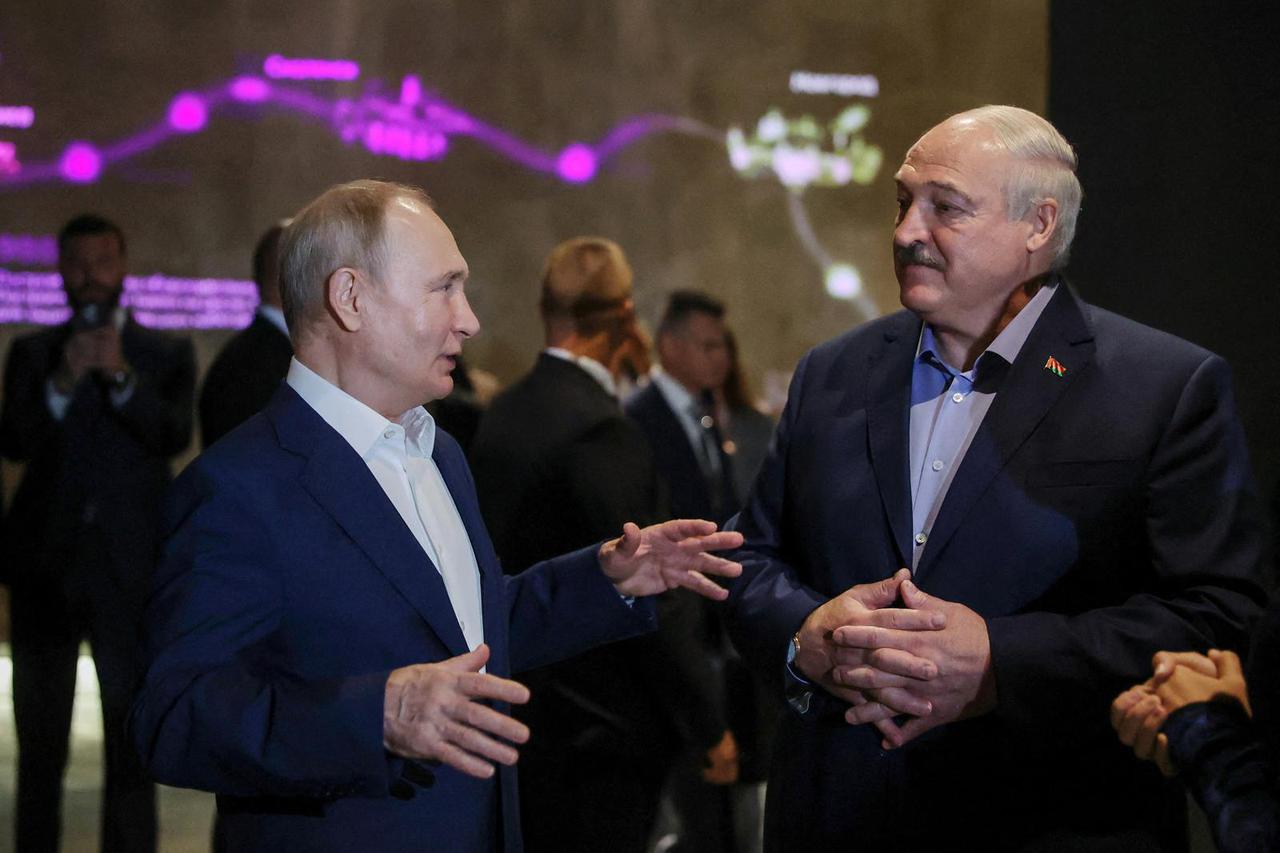 FILE PHOTO: Russian President Vladimir Putin and Belarusian President Alexander Lukashenko visit the Museum of Naval Glory in Kronstadt