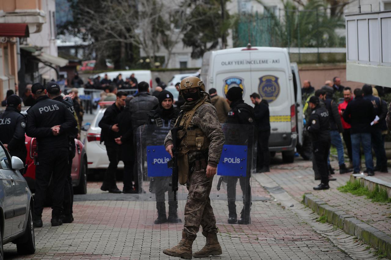 Turkish police stand guard outside the Santa Maria Catholic Church in Istanbul
