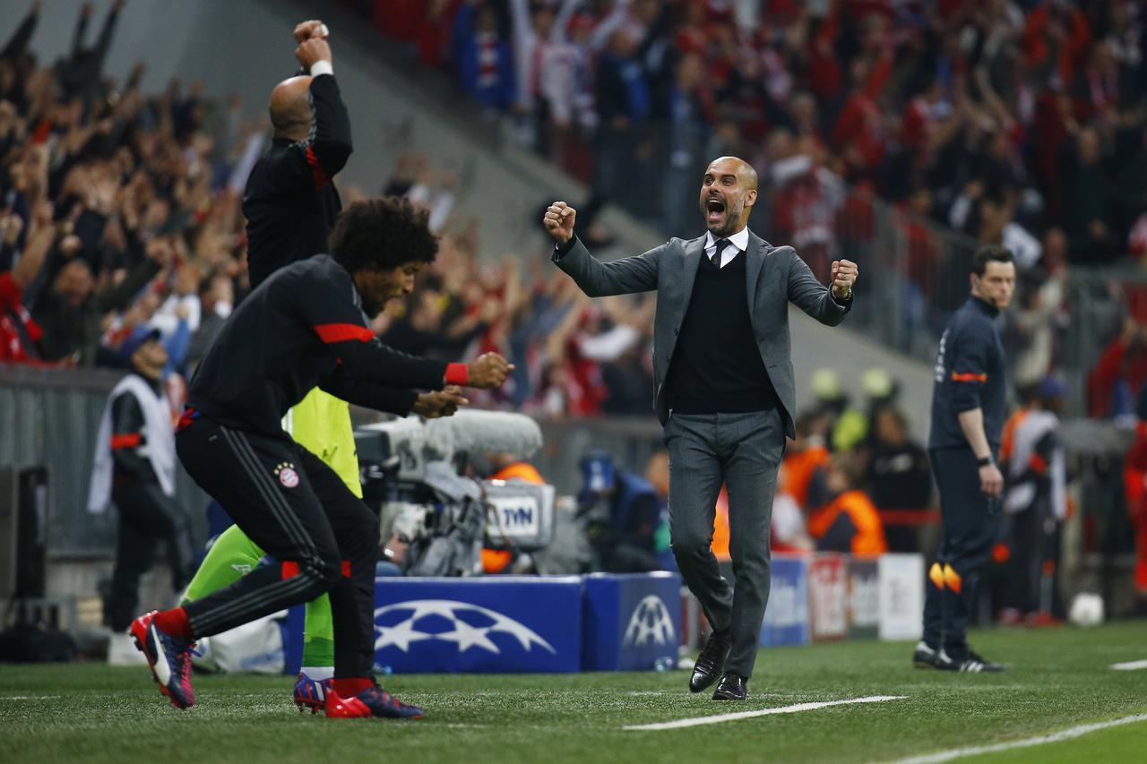 Football - Bayern Munich v Porto - UEFA Champions League Quarter Final Second Leg - Allianz Arena, Munich - Germany - 21/4/15  Bayern Munich's coach Josep Guardiola celebrates their fifth goal Reuters / Kai Pfaffenbach