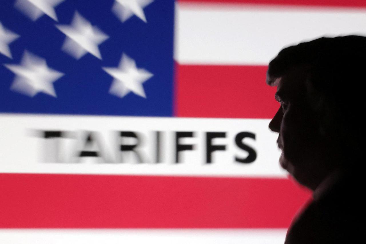 Illustration shows 3D-printed model of U.S. President Trump and U.S. flag pattern with word "tariffs\