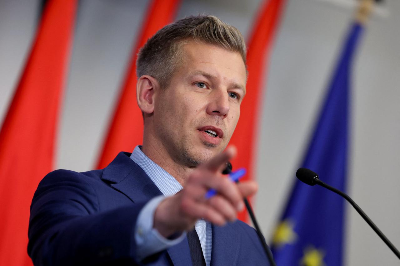 Election winner Magyar speaks during a press conference in Budapest