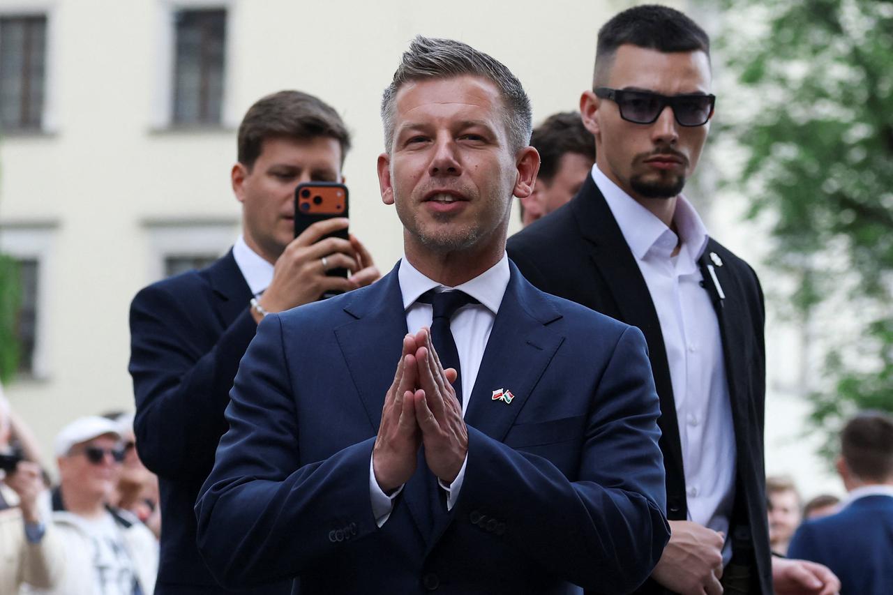 storyeditor/2026-05-22/2026-05-19T134926Z_718776070_RC2DCLA1ADEH_RTRMADP_3_POLAND-HUNGARY-MAGYAR.JPG