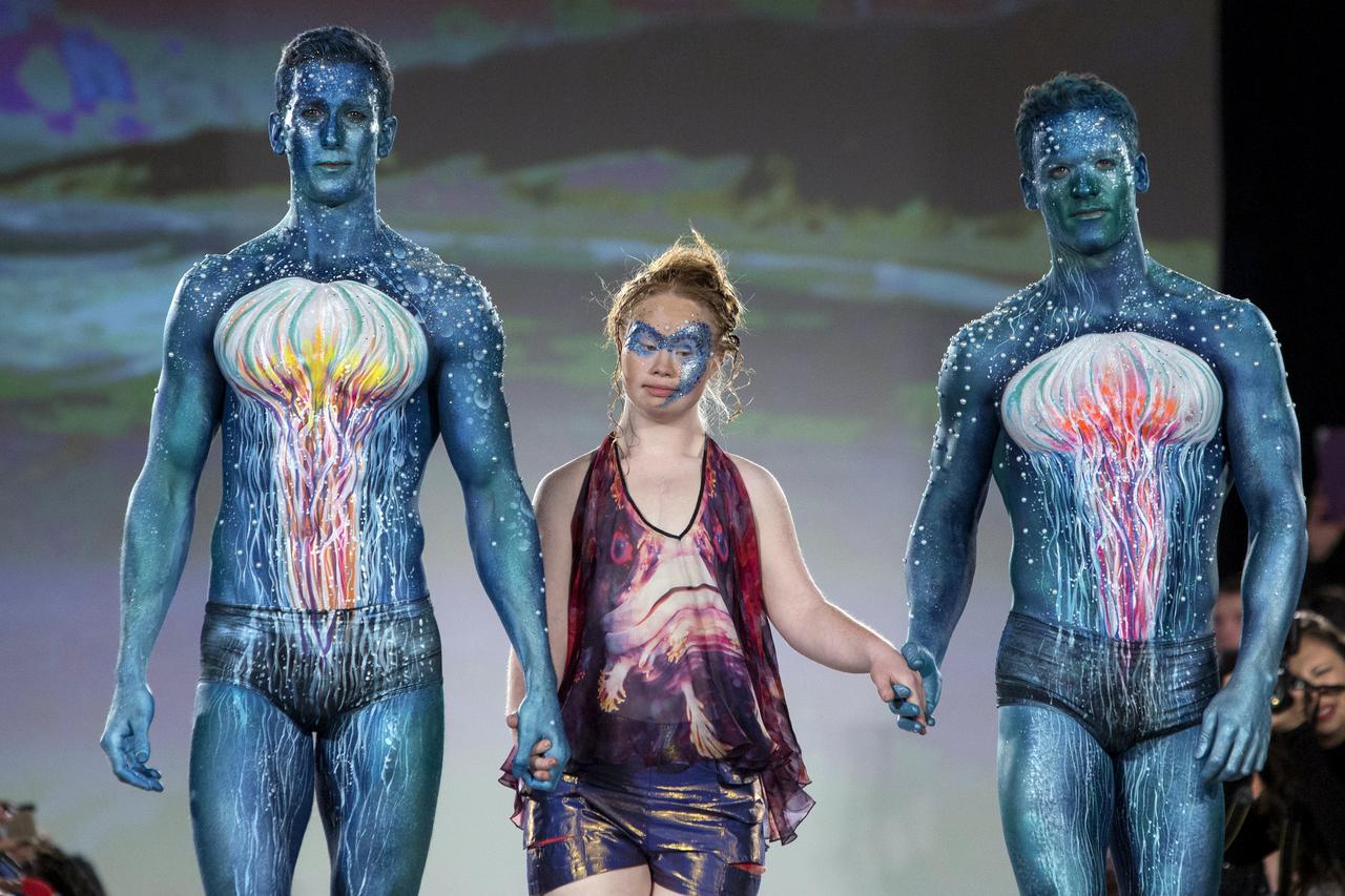 Madeline Stuart, an Australian model with Down Syndrome, presents a creation from the Hendrik Vermeulen label during the FTL Moda presentation of the Spring/Summer 2016 collection during New York Fashion Week in Vanderbilt Hall at Grand Central Station, N