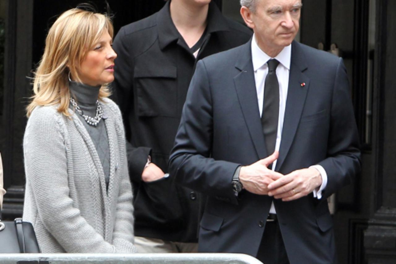 'Exclusive. CEO of LVMH Bernard Arnault with his wife Helene Mercier and their son leave the Mercer Hotel in Soho, New York, NY on May 7, 2012. Photo: Press Association/PIXSELL'