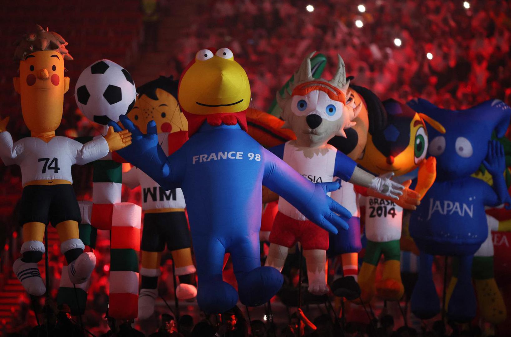 Soccer Football - FIFA World Cup Qatar 2022 - Group A - Qatar v Ecuador - Al Bayt Stadium, Al Khor, Qatar - November 20, 2022 General view of inflatable mascots of previous World Cups during the opening ceremony REUTERS/Kim Hong-Ji Photo: KIM HONG-JI/REUTERS