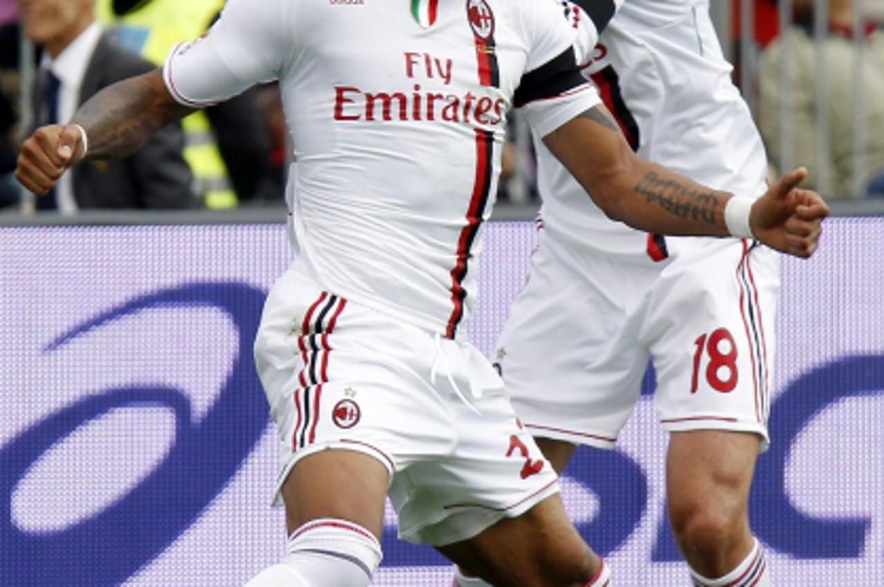 'AC Milan\'s Kevin-Prince Boateng (L) celebrates with his team mate Alberto Aquilani after scoring a third goal against Lecce during their Italian Serie A soccer match at the Via del Mare stadium in L