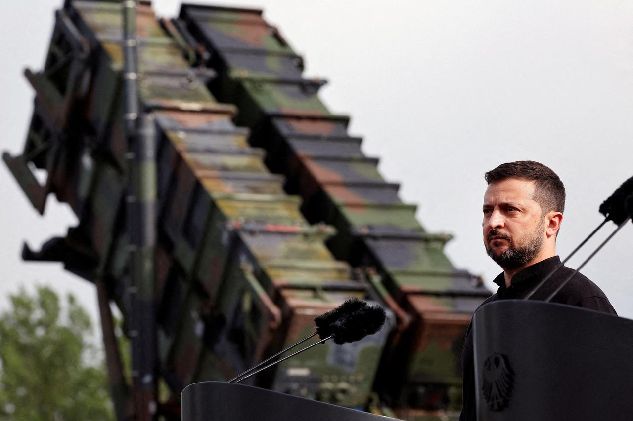 FILE PHOTO: Ukrainian President Volodymyr Zelenskiy visit to a military training area