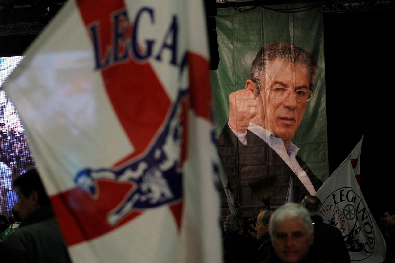FILE PHOTO: A picture of Italy's Northern League former leader Umberto Bossi is seen on a poster during the Northern League rally in Bergamo