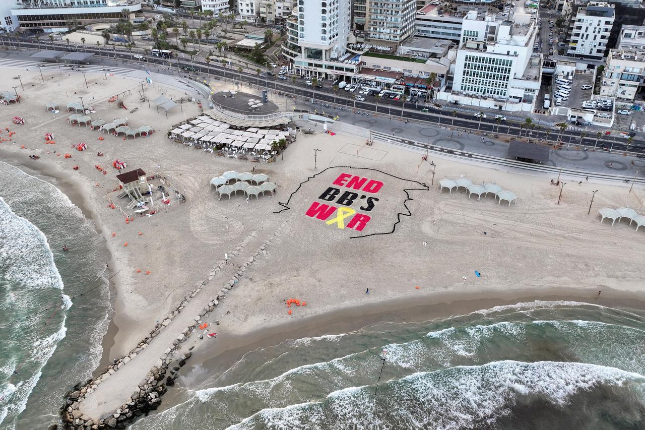 FILE PHOTO: Aid packages are airdropped over Gaza