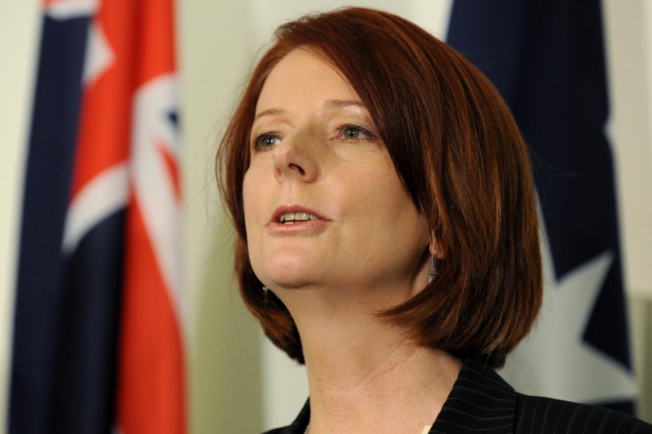 'Australia\'s new prime minister Julia Gillard speaks during a press conference, in Canberra on June 24, 2010.  Gillard became the country\'s first female prime minister after former leader Kevin Rudd