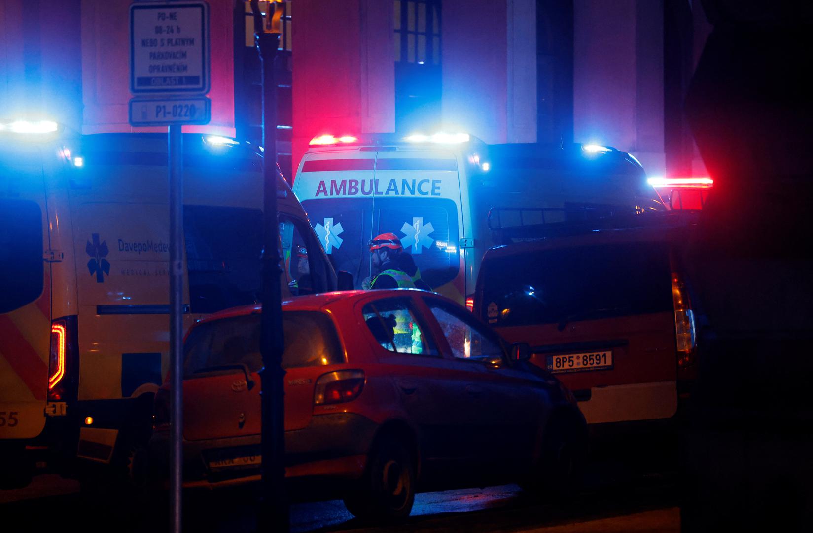 Medics stand next to ambulances parked near the area of the shooting at one of the buildings of Charles University in Prague, Czech Republic, December 21, 2023. REUTERS/David W Cerny Photo: DAVID W CERNY/REUTERS