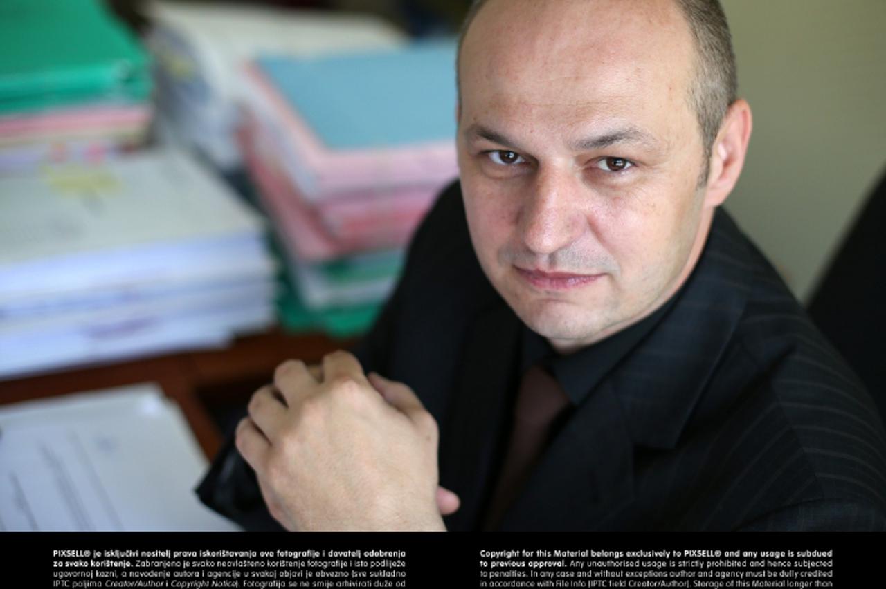 '01.08.2013., Zagreb - Mislav Kolakusic, sudac Trgovackog suda.  Photo: Jurica Galoic/PIXSELL'