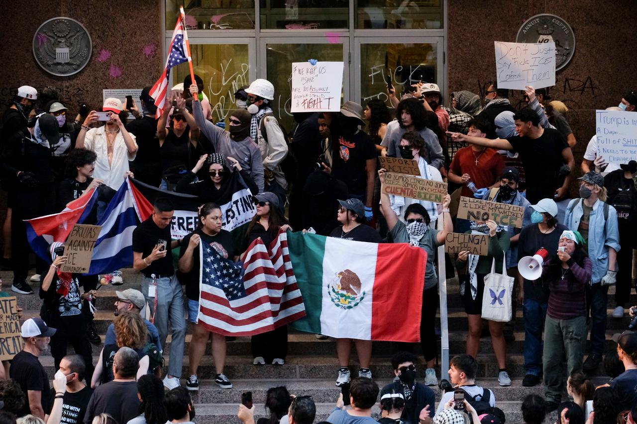 Rally in solidarity with Los Angeles protests against federal immigration sweeps, in Austin
