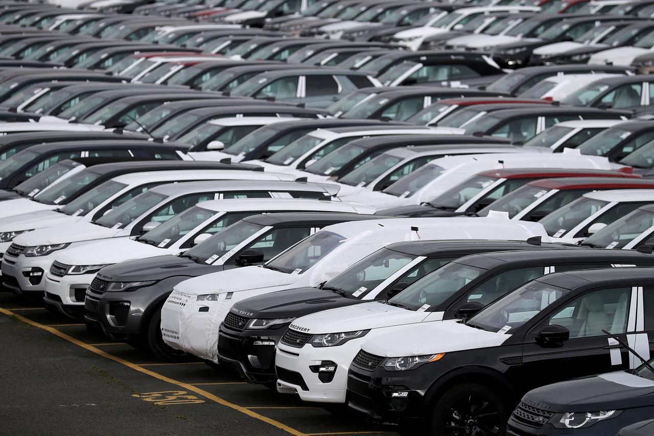 FILE PHOTO: New Land Rover cars are seen in a parking lot at the Jaguar Land Rover plant at Halewood in Liverpool, northern England.