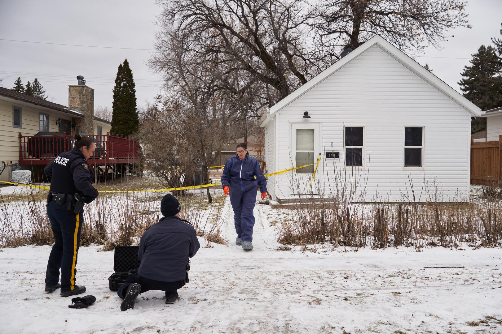 RCMP and forensic investigators on the scene of an ongoing investigation regarding five deaths in southern Manitoba, in Carman, Man., Monday, Feb. 12, 2024. THE CANADIAN PRESS/David Lipnowski