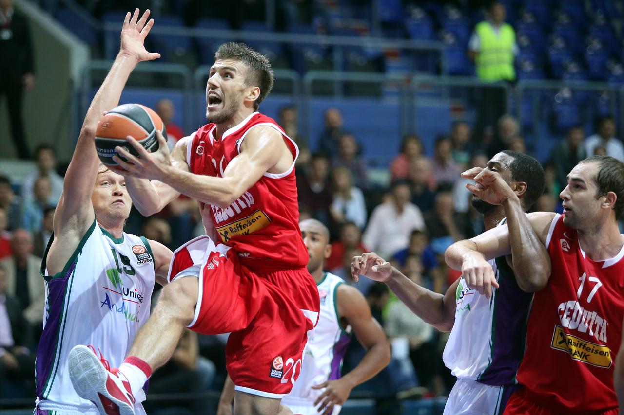 16.10.2014., Dom sportova, Zagreb - Euroliga, 1. kolo, Cedevita - Unicaja. Mindaugas Kuzminskas, Nemanja Godic.  Photo: Sanjin Strukic/PIXSELL