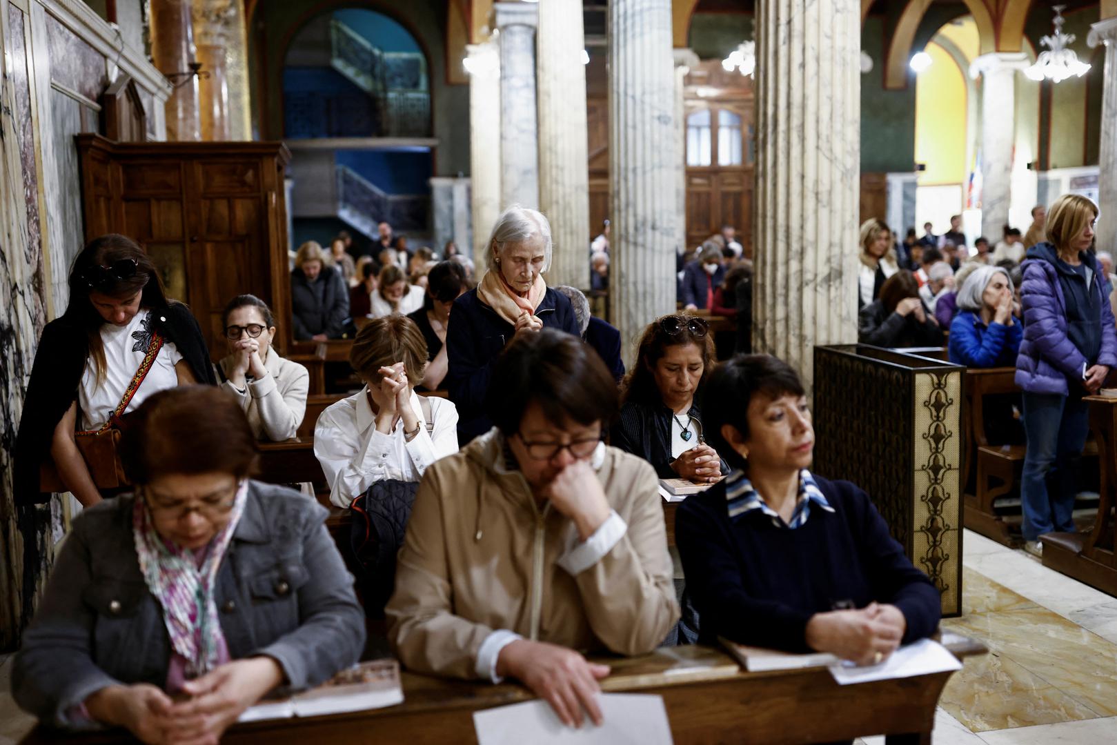 People attend a Holy Mass in memory of Pope Francis at the Church of Santa Maria Addolorata, after the death of the pontiff was announced by the Vatican, in Rome, Italy, April 21, 2025. REUTERS/Matteo Minnella Photo: Matteo Minnella/REUTERS