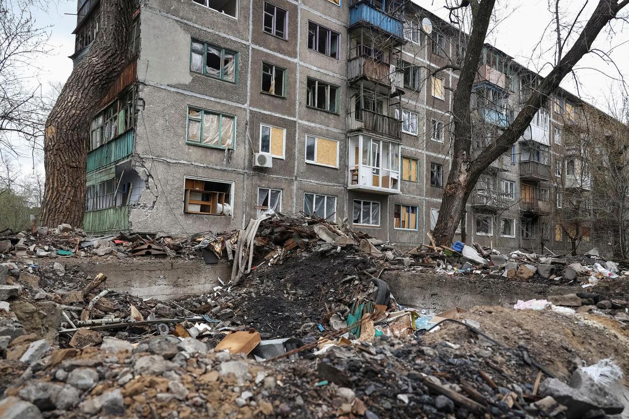 View shows a residential building damaged by shelling in the town of Chasiv Yar near a front line in Donetsk region