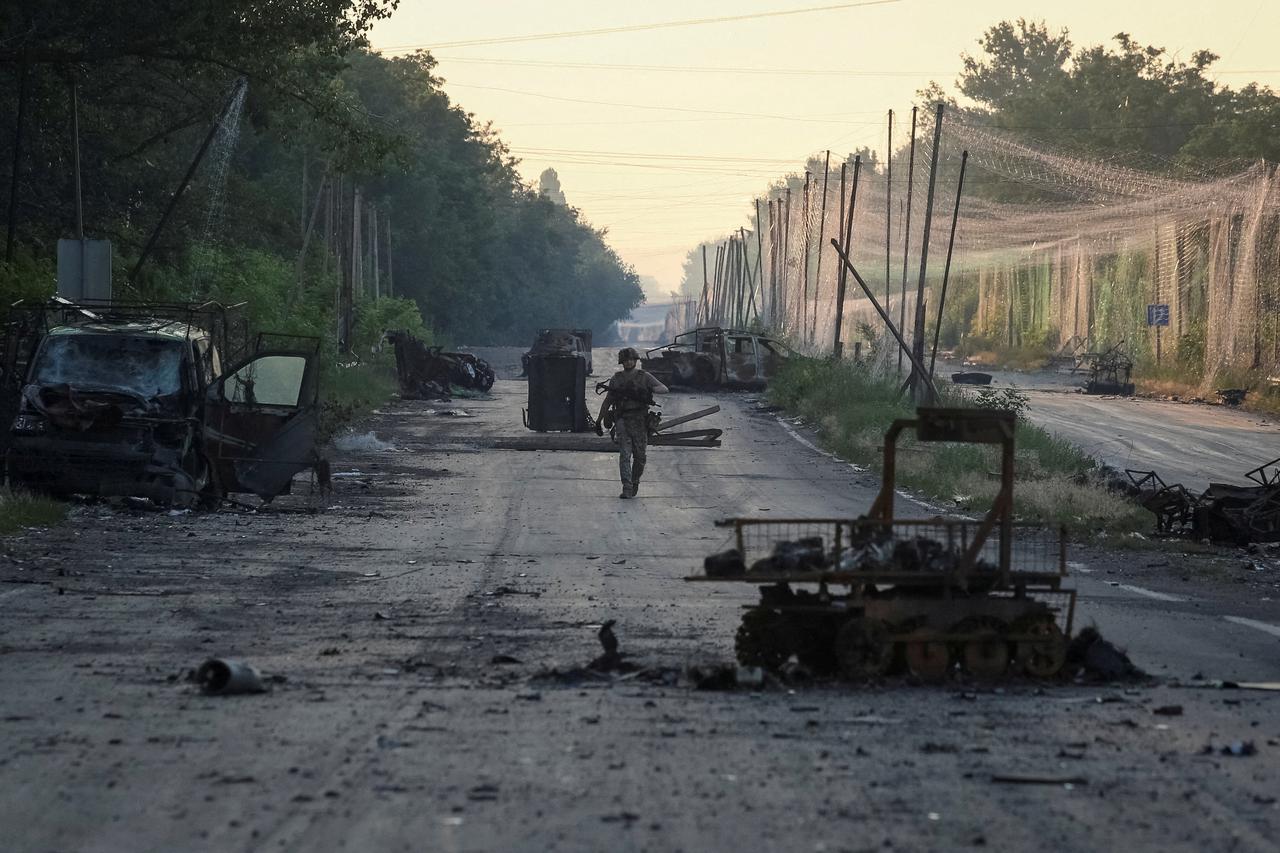 FILE PHOTO: Ukrainian servicemen take part in a mission to protect road from Russian drones between frontline towns of Druzhkivka and Kostiantynivka