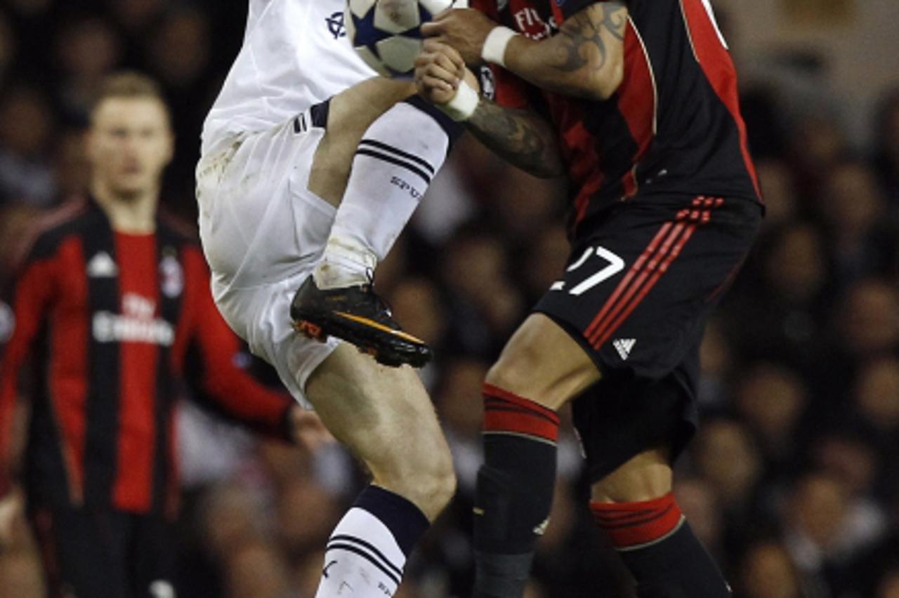 'AC Milan\'s Kevin-Prince Boateng (R) challenges Tottenham Hotspur\'s Luka Modric during their Champions League soccer match at White Hart Lane in London March 9, 2011 .  REUTERS/Alessandro Bianchi (B