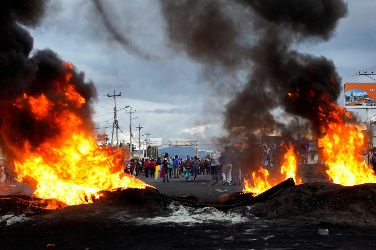 Indigenous demonstrators march towards Quito after a week of protests against Ecuadoran President  Lasso, in Machachi