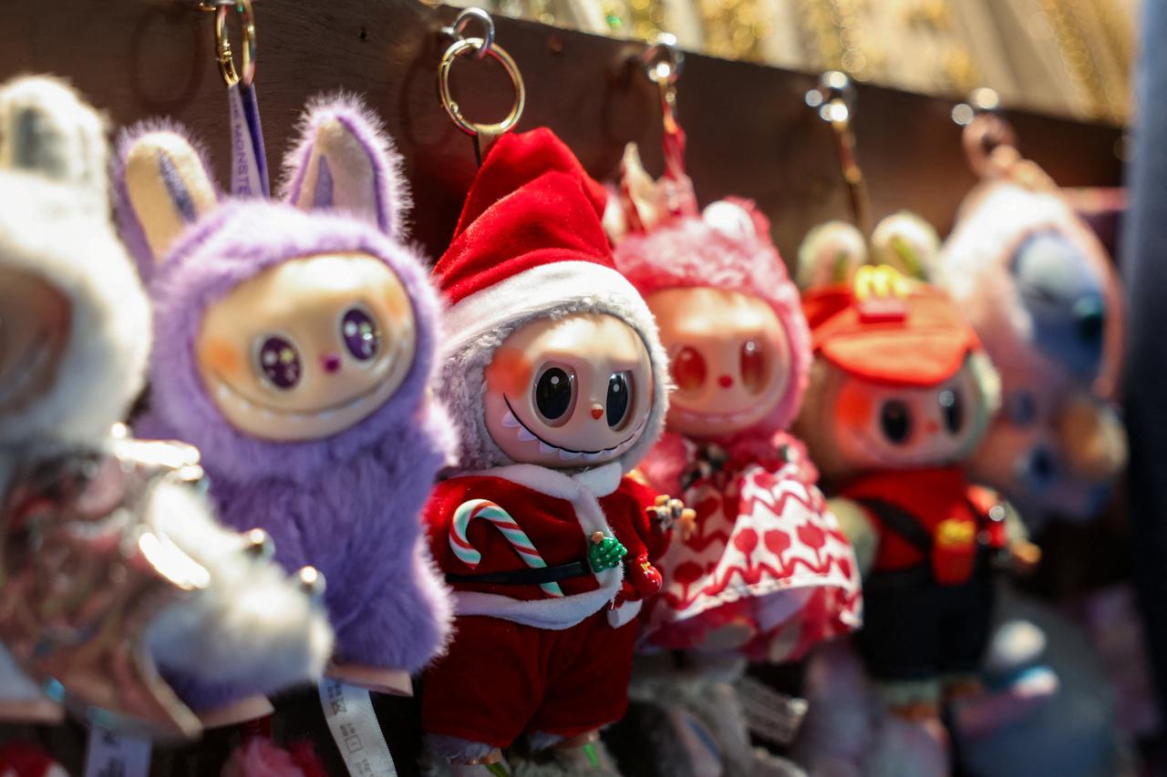 A Labubu in a Santa Claus outfit is displayed for sale at a holiday market in Times Square in New York