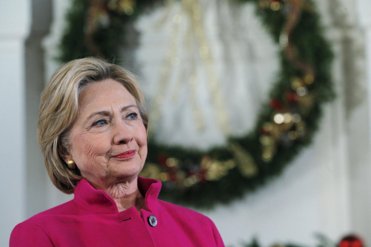 U.S. Democratic presidential candidate Hillary Clinton listens as she is introduced at a campaign town hall meeting at South Church in Portsmouth, New Hampshire, December 29, 2015.  REUTERS/Brian Snyder