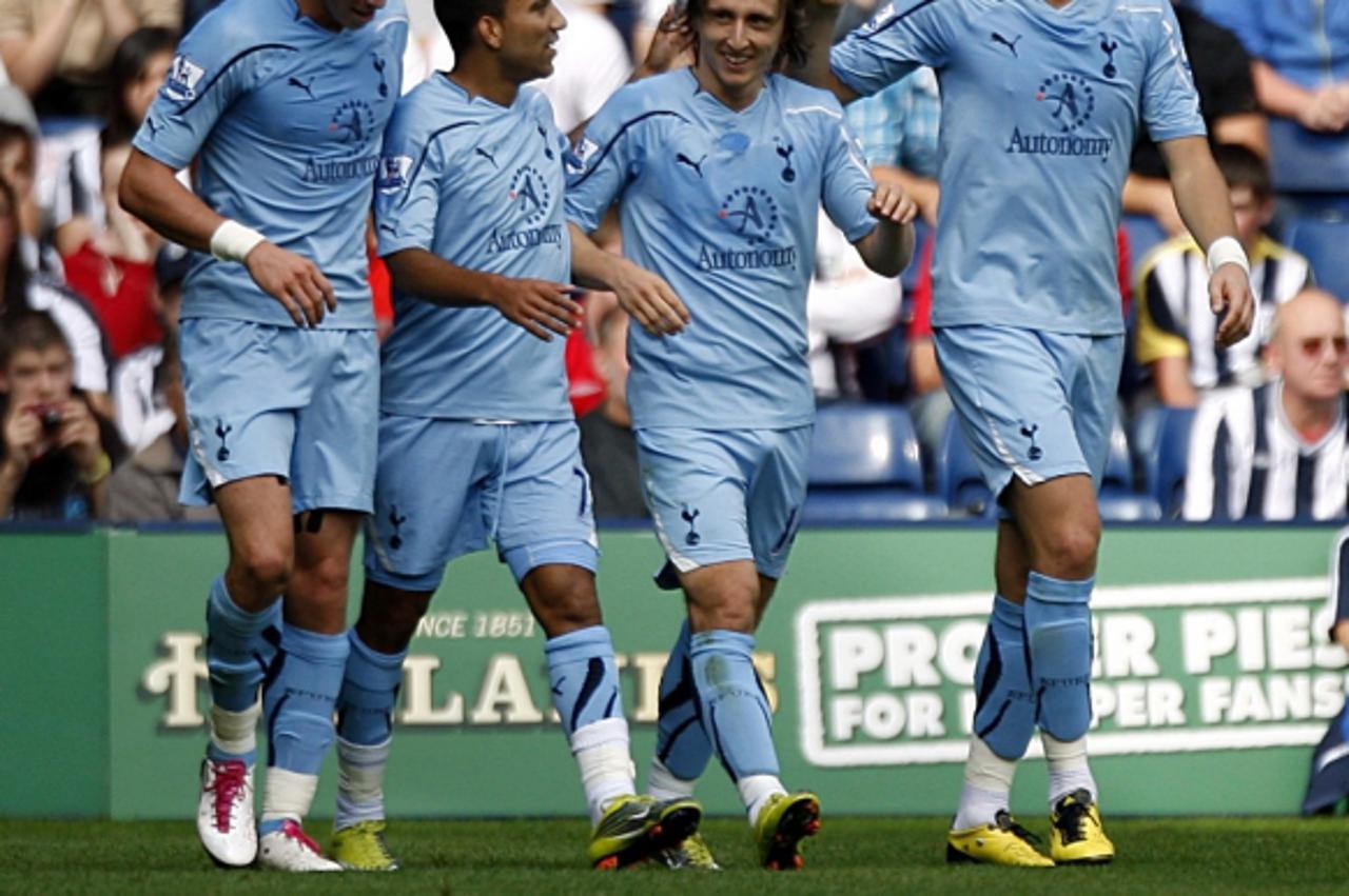 'Tottenham Hotspur\'s Luka Modric (centre right) celebrates scoring his sides first goal of the game Photo: Press Association/Pixsell'