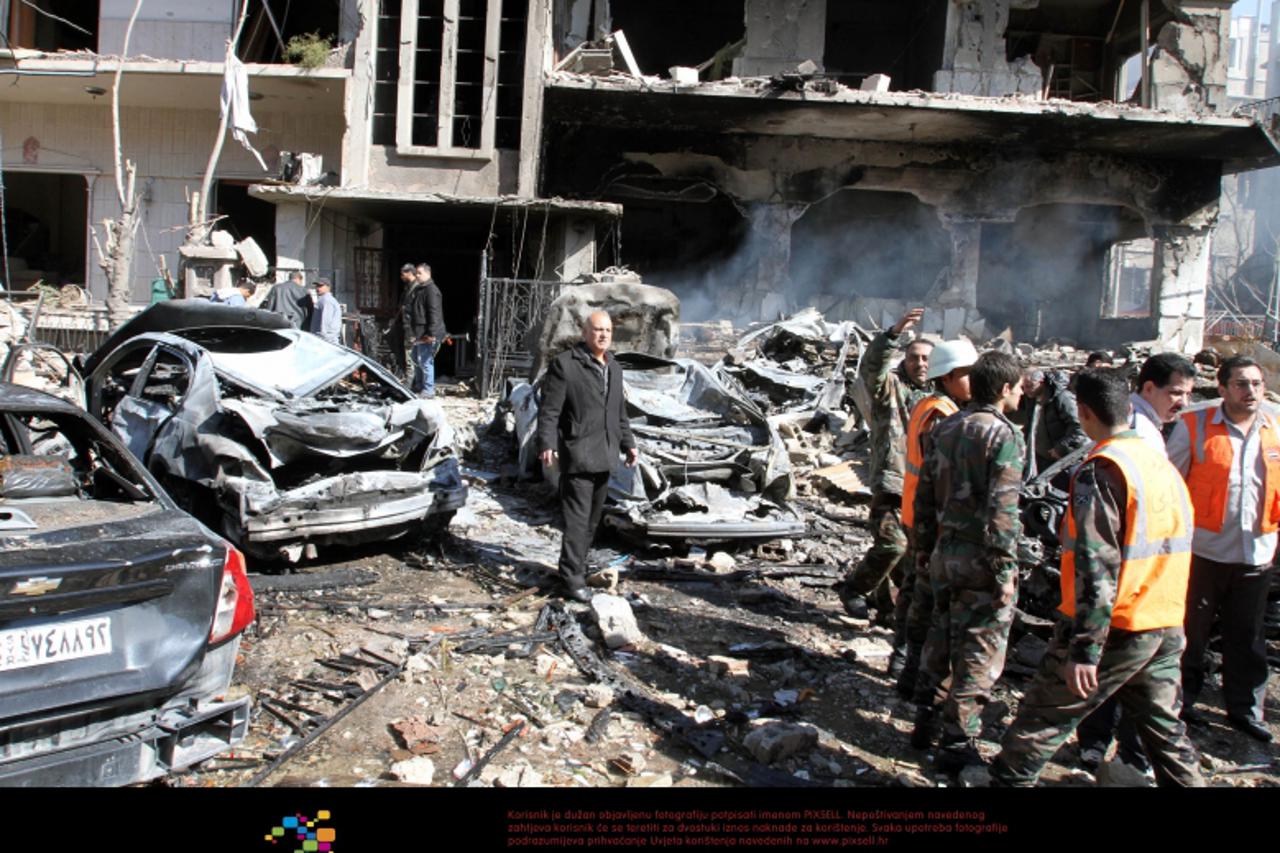 '(120317) -- DAMASCUS, March 17, 2012 () -- The blast site is seen in Damascus, Syria, on March 17, 2012. A total of 27 people were killed and nearly 100 wounded in two suicide bombings targeting secu