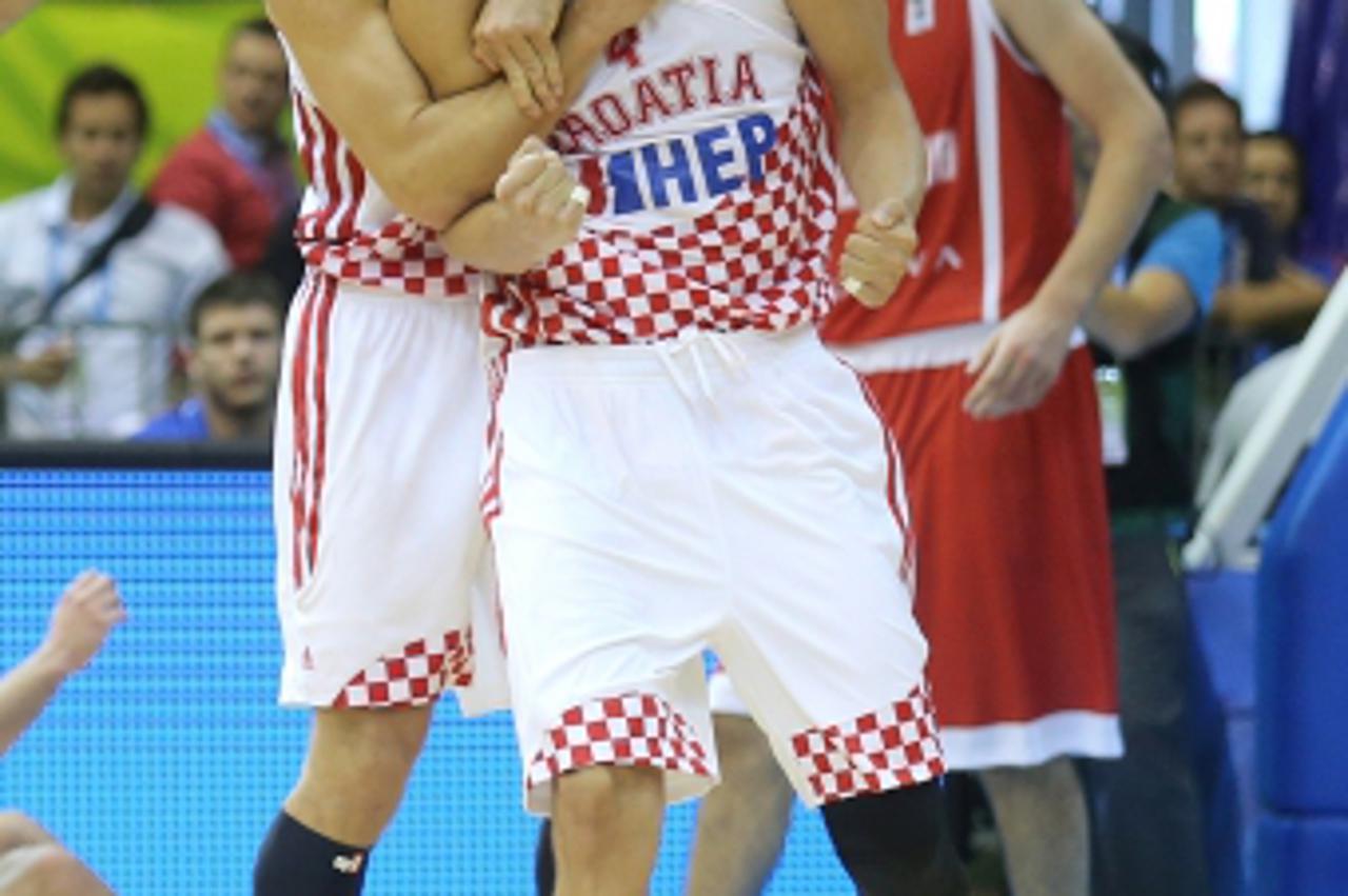 '05.09.2013., Slovenia, Celje - Europsko prvenstvo u kosarci Eurobasket Slovenia 2013.Grupa C. Hrvatska - Gruzija. Ante Tomic; Bojan BogdanovicAnte Tomic i Bojan Bogdanovic. Photo: Igor Kralj/PIXSELL'