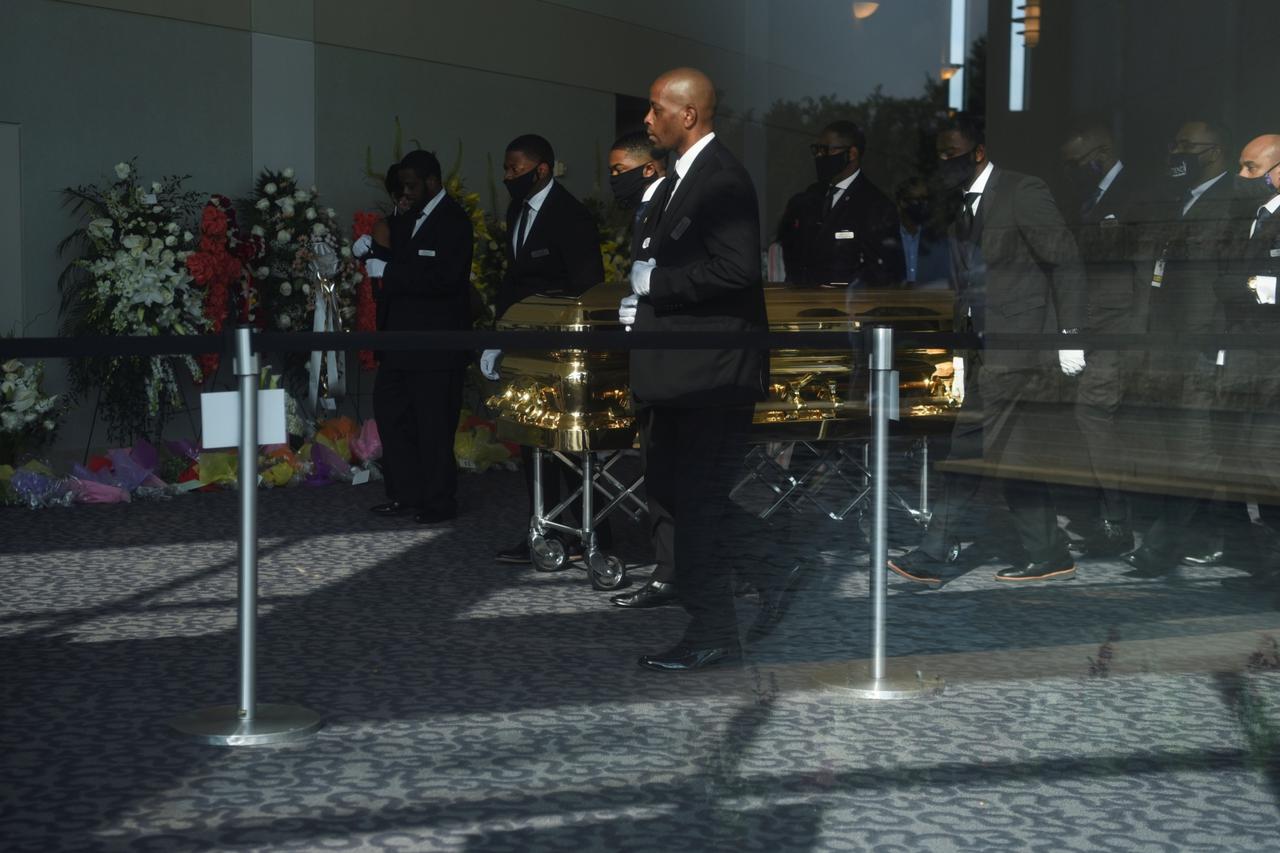 George Floyd's casket is carried into his funeral in Houston