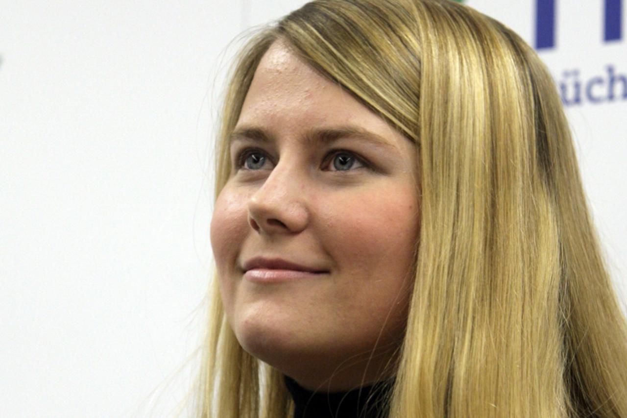 'Austrian kidnap victim Natascha Kampusch arrives for the presentation or her book 3,096 Days in a bookstore in Vienna September 9, 2010.  Kampusch\'s memoirs, which appeared in Vienna on Tuesday, rec