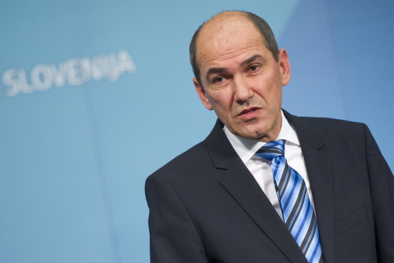'Slovenian Prime Minister Janez Jansa gives a press conference on December 2, 2012 after the results of the run-off vote of the presidential elections in Ljubljana. Former Prime Minister Borut Pahor w