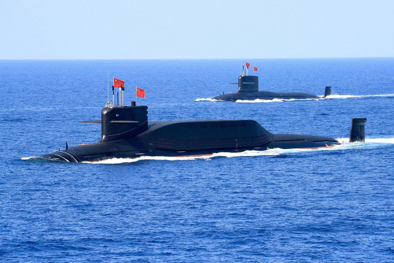 FILE PHOTO: Nuclear-powered Type 094A Jin-class ballistic missile submarine of the Chinese People's Liberation Army (PLA) Navy navigates during a military display in the South China Sea