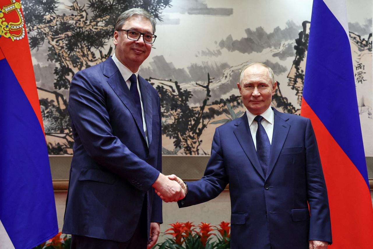 Russian President Vladimir Putin meets with Serbian President Aleksandar Vucic in Beijing