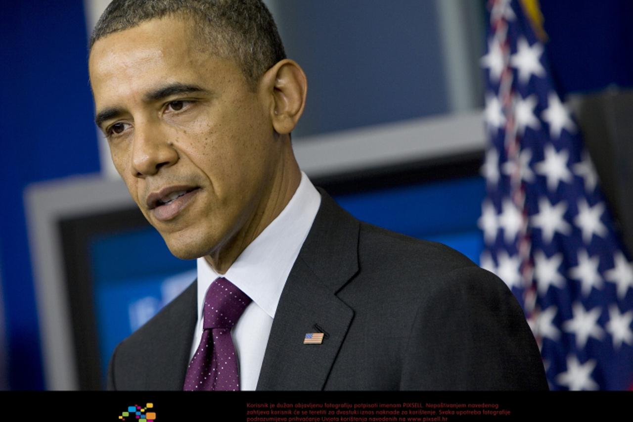 'United States President Barack Obama makes a surprise appearance at the daily press briefing at the White House in Washington, D.C. on Tuesday, December 20, 2011 to urge the House of Representatives 